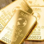 Gold Prices Dip Amid Trade Deal Optimism and Stable Dollar: Essential Insights for Investors